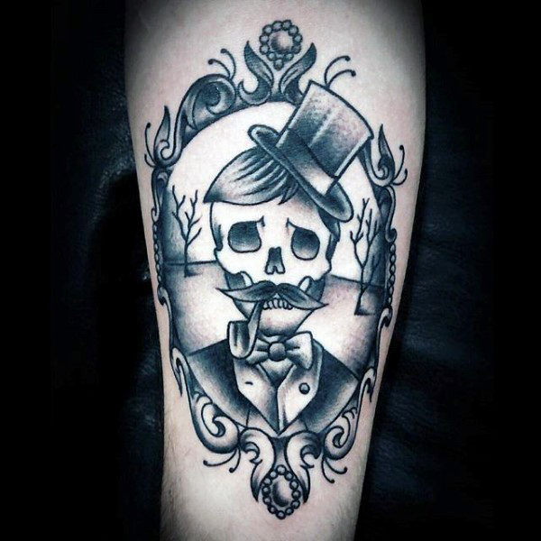 Grey shaded men traditional skull tattoo on arm for men