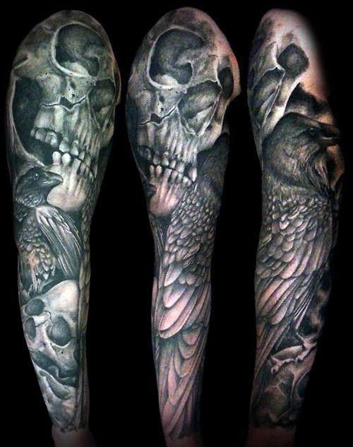 Grey shaded skull tattoo on full sleeve