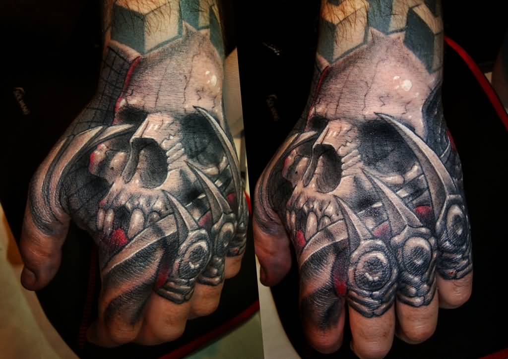 Grey shaded skull tattoo on hand for men