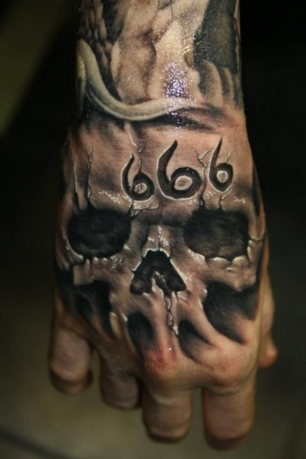 Grey shaded skull tattoo with number on right hand for men