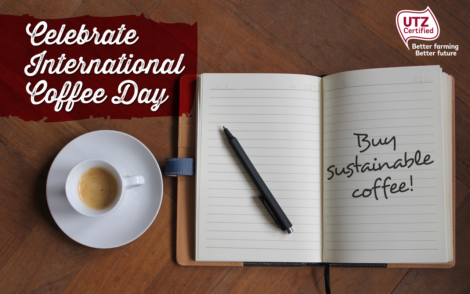 celebrate international coffee day note book and coffee cup