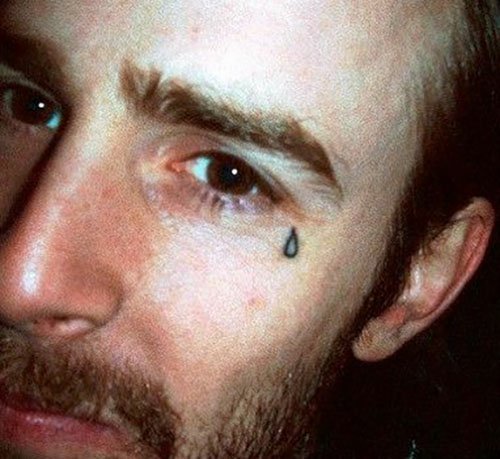 Black unfilled left eye teardrop tattoo for men