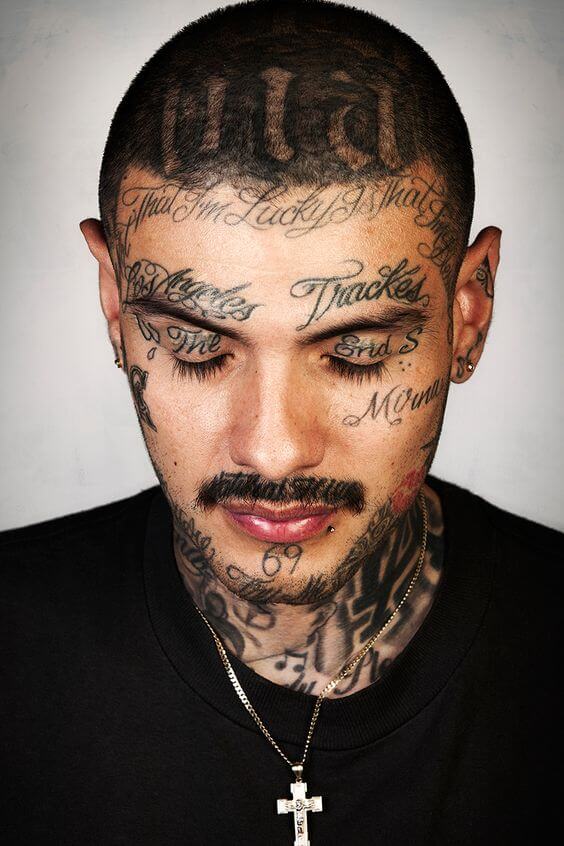 Black unfilled right eye teardrop with text tattoo for men