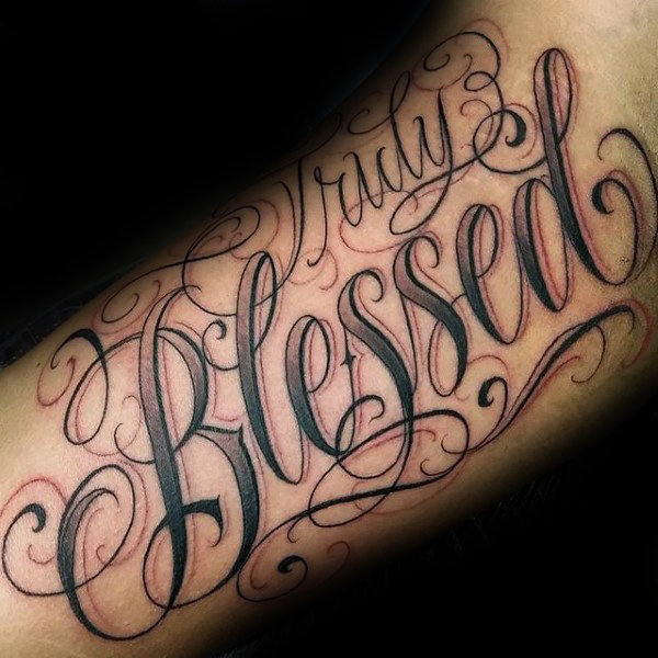 Black and grey shaded simple truly blessed tattoo on arm