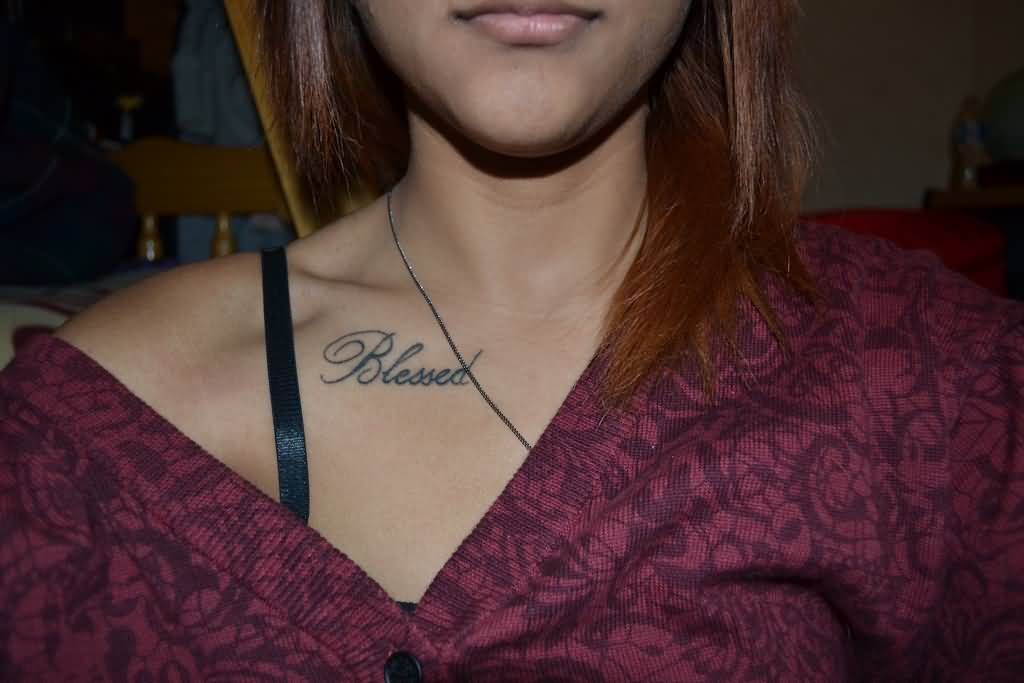Black simple blessed tattoo below right collar bone for women