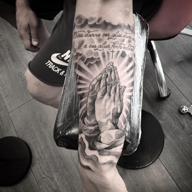 Grey shaded joined hands blessed tattoo on upper sleeve for men