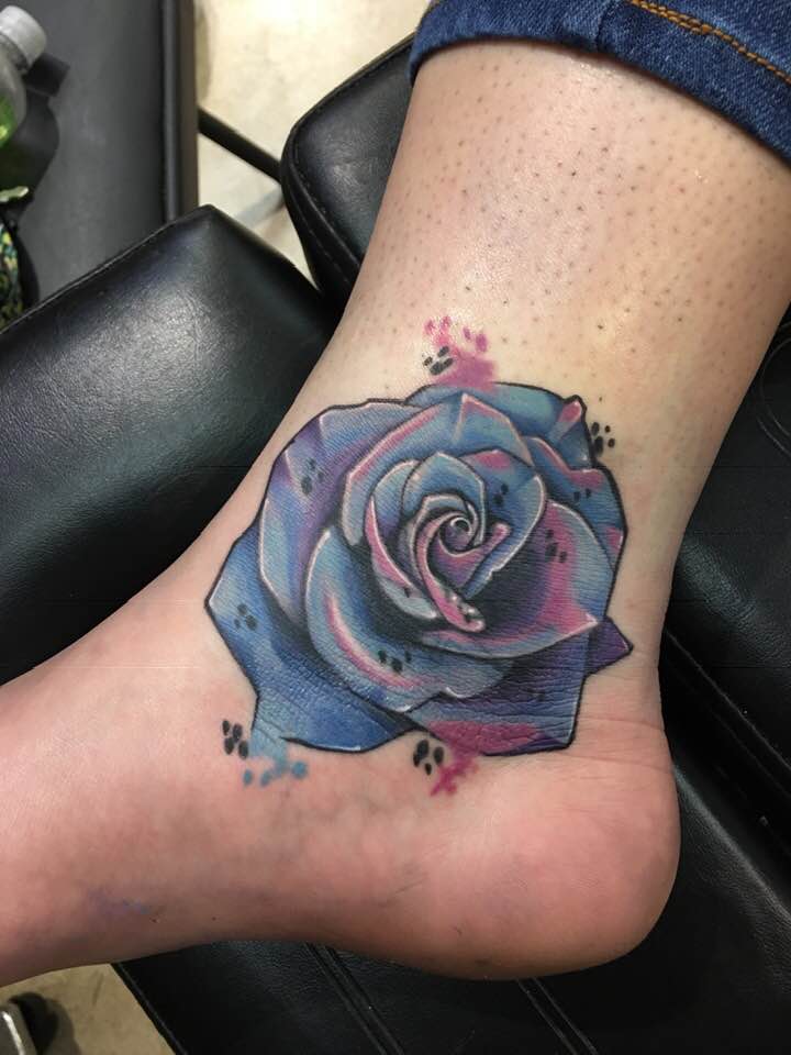 Beautiful blue pink rose tattoo by Zak Schulte