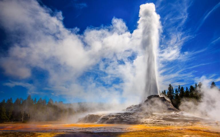 erupting geyser in yellowstone national park