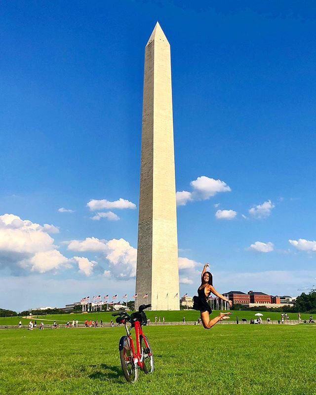 girl posing with the washington monument