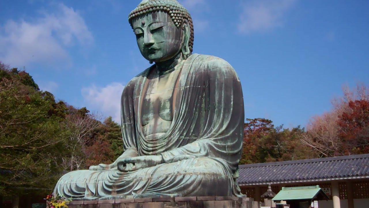 the statue of Great Buddha with blue sky