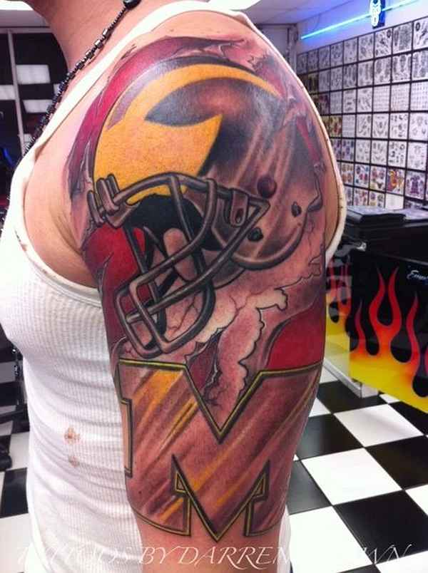 Michigan Wolverines – American football tattoo on men half sleeve
