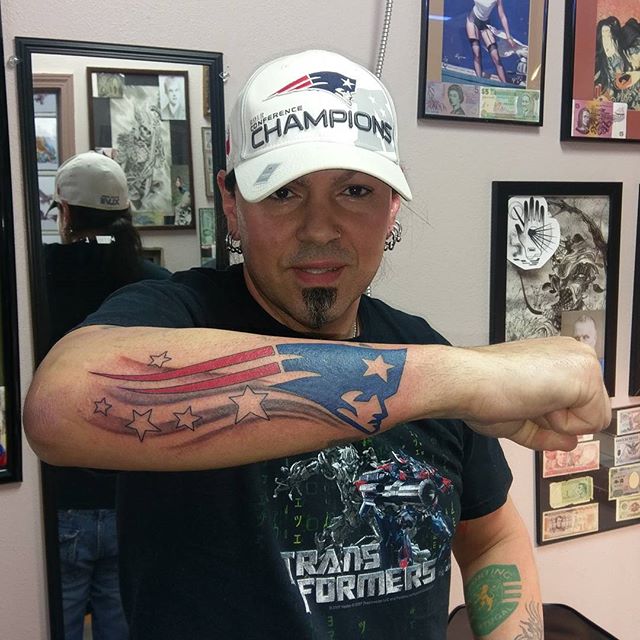 New England Patriots Logo Tattoo On Men’s Outer Forearm