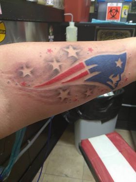 New England Patriots With Stars Tattoo On Arm