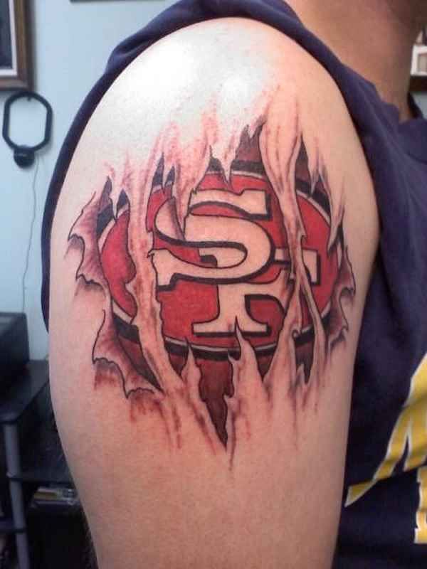 Ripped Skin San Francisco 49ers Tattoo On Mens Shoulder