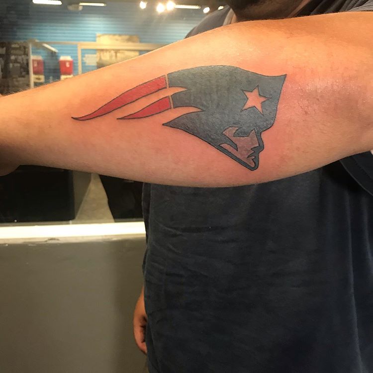 Simple New England Patriots Logo Tattoo On Man’s Outer Forearm