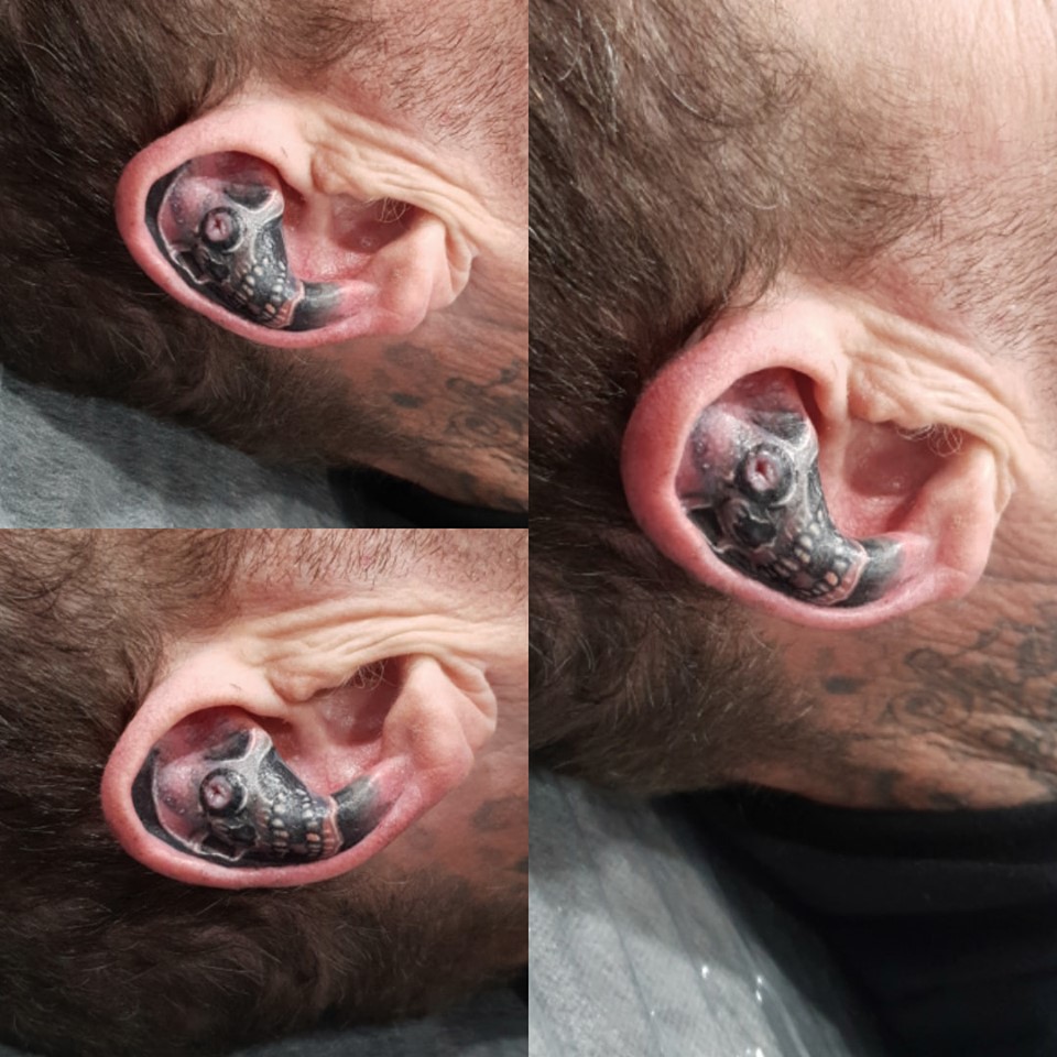 Amazing Small Ear Tattoo By Levi Bell