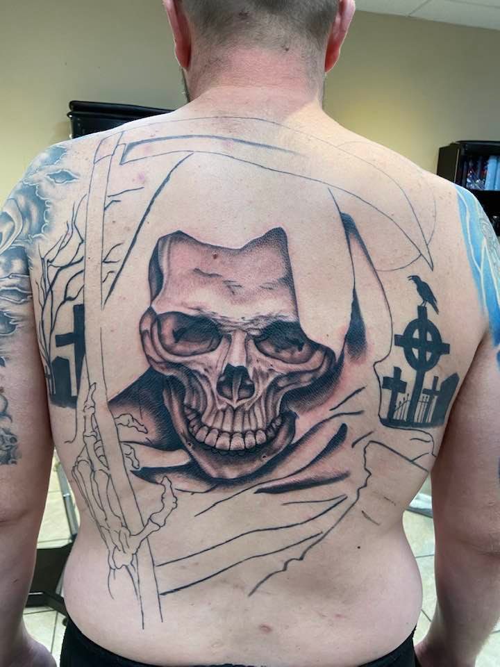 3D skull tattoo on full back by Zak Schulte