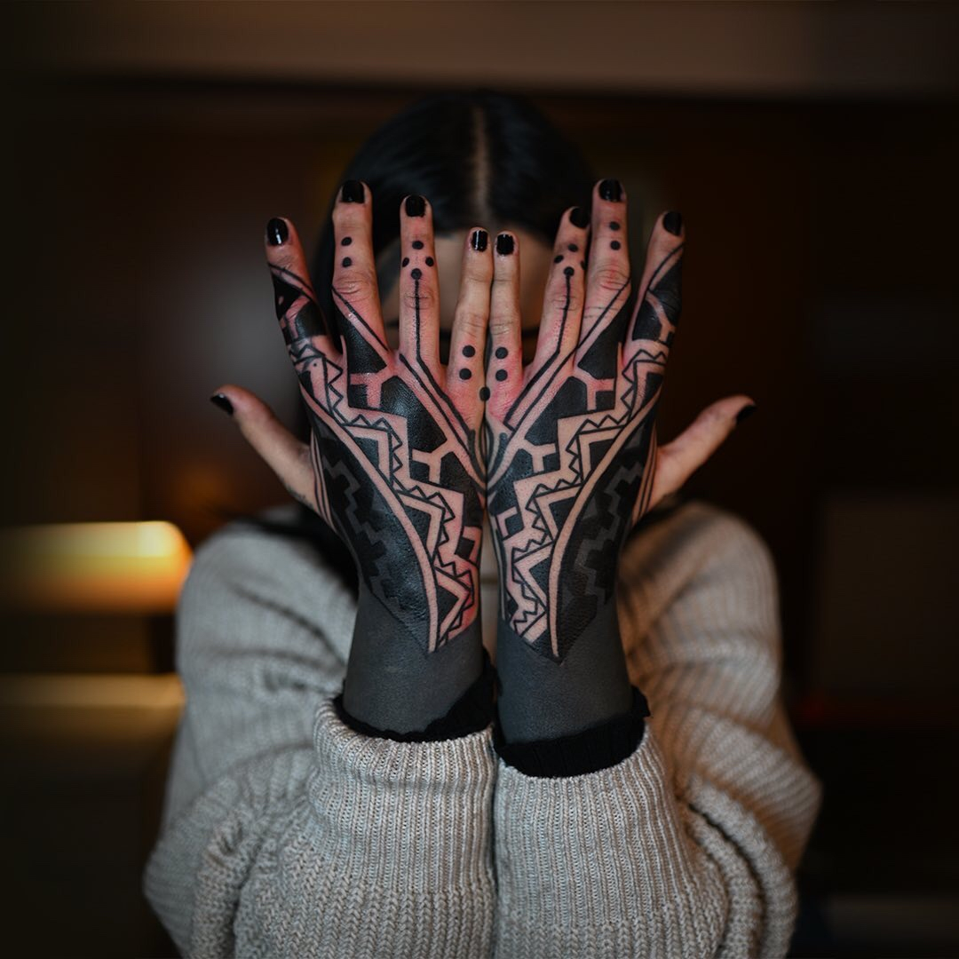 Amazing black ink hands tattoo for girls by Black Ink Power