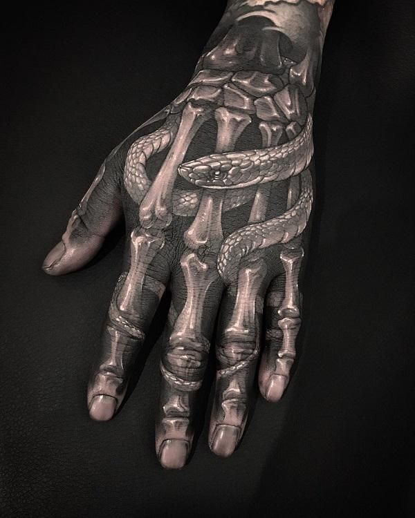 Gothic Snakes and Skeleton Hand Tattoo