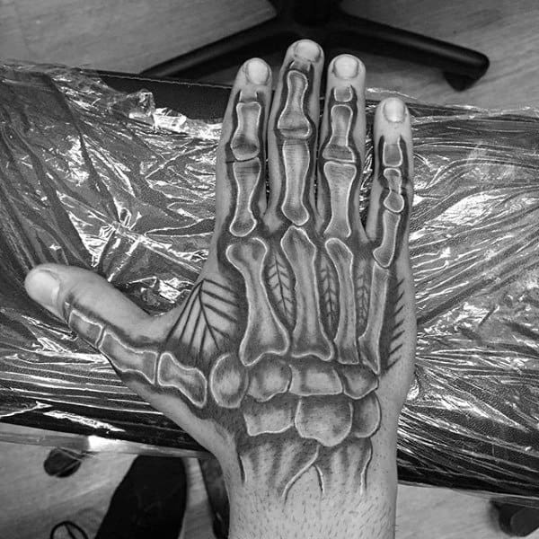 Grey Ink Skeleton Hand Tattoo For Men