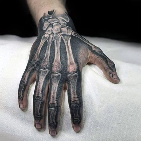 Realistic Black Ink Skeleton Hand Tattoo
