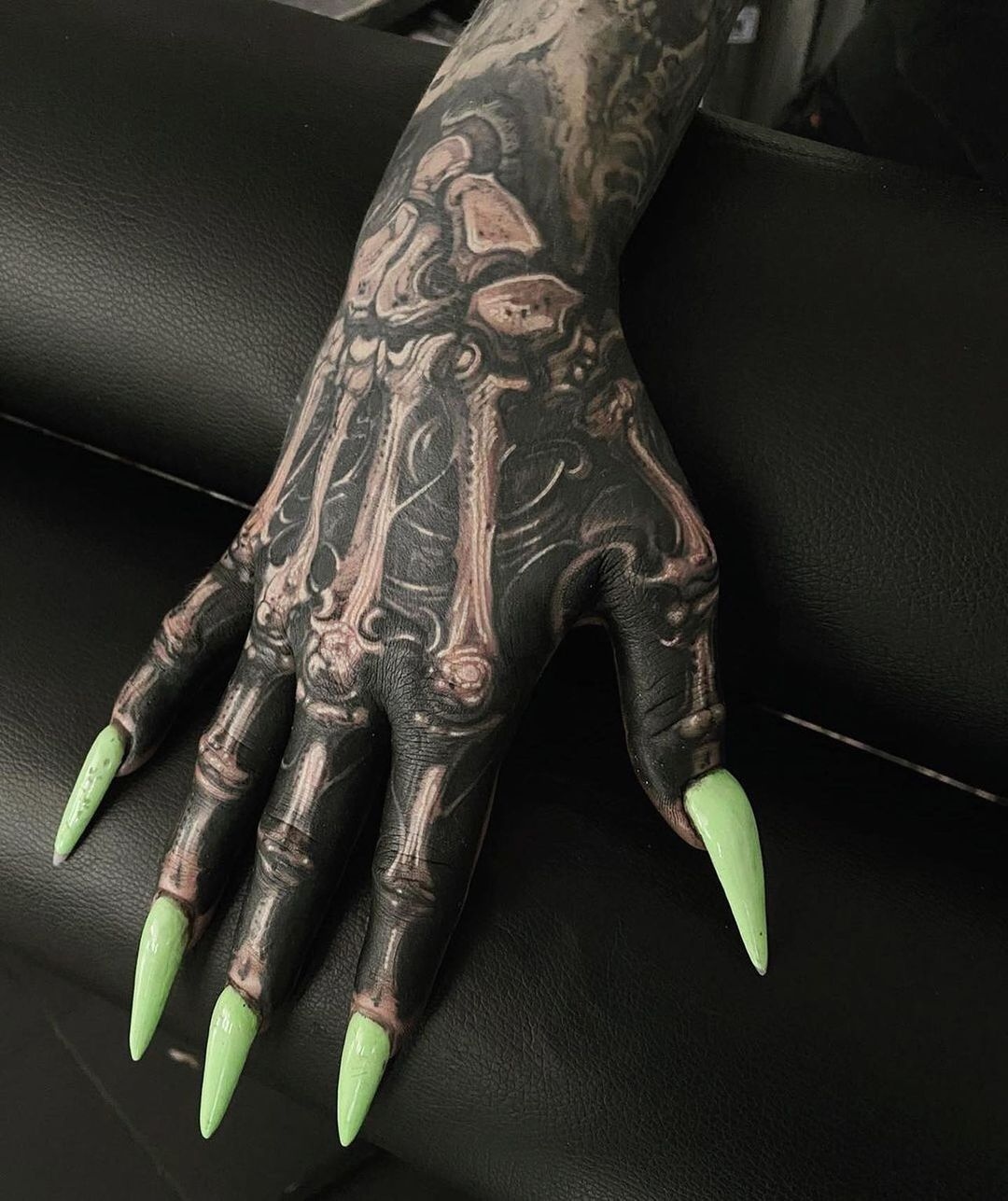 Wonderful Skeleton Hand Tattoo By Piotr Polak