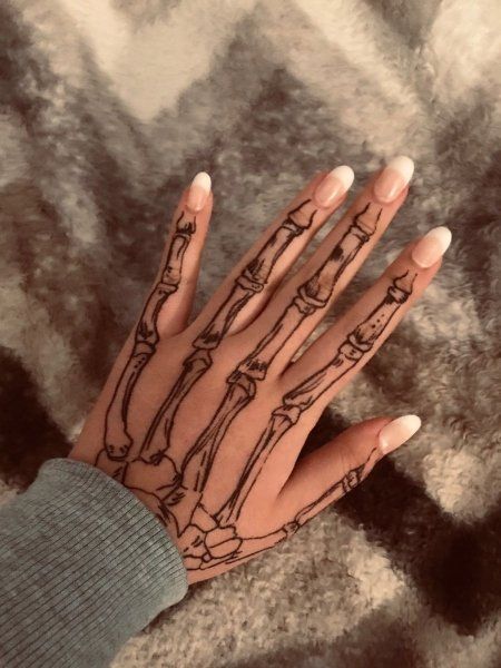 Wonderful Skeleton Hand Tattoo For Women