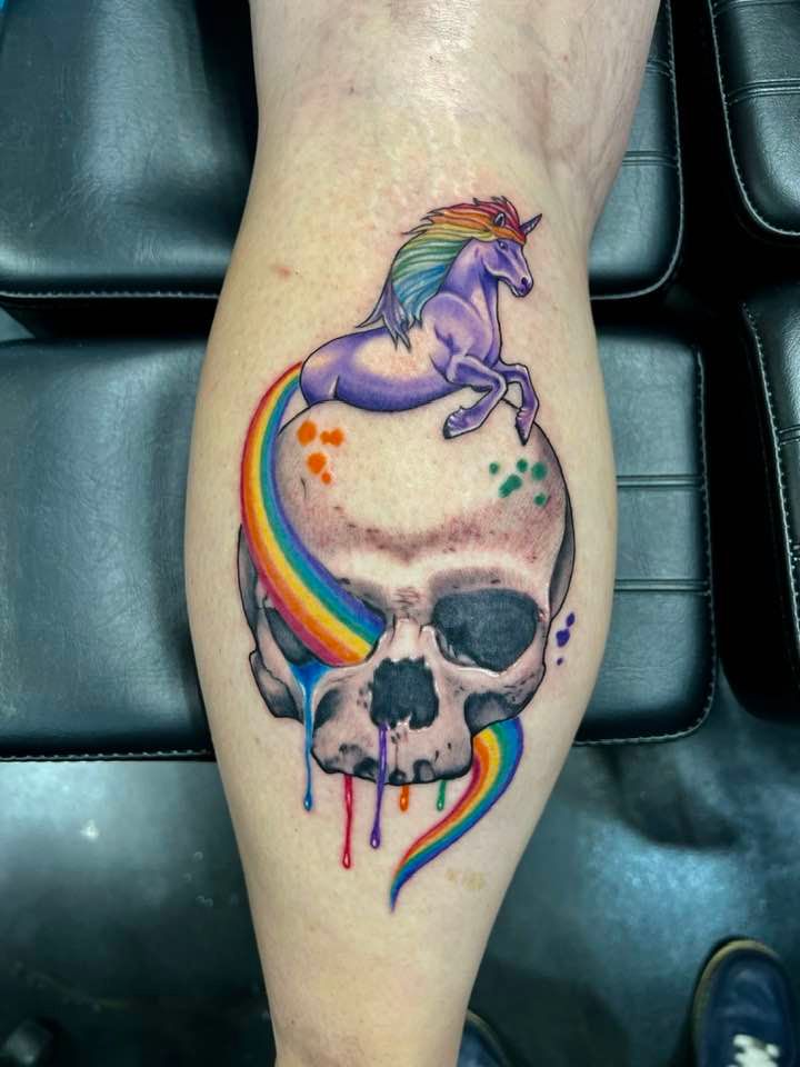 Amazing Skull and Unicorn Tattoo By Zak Schulte