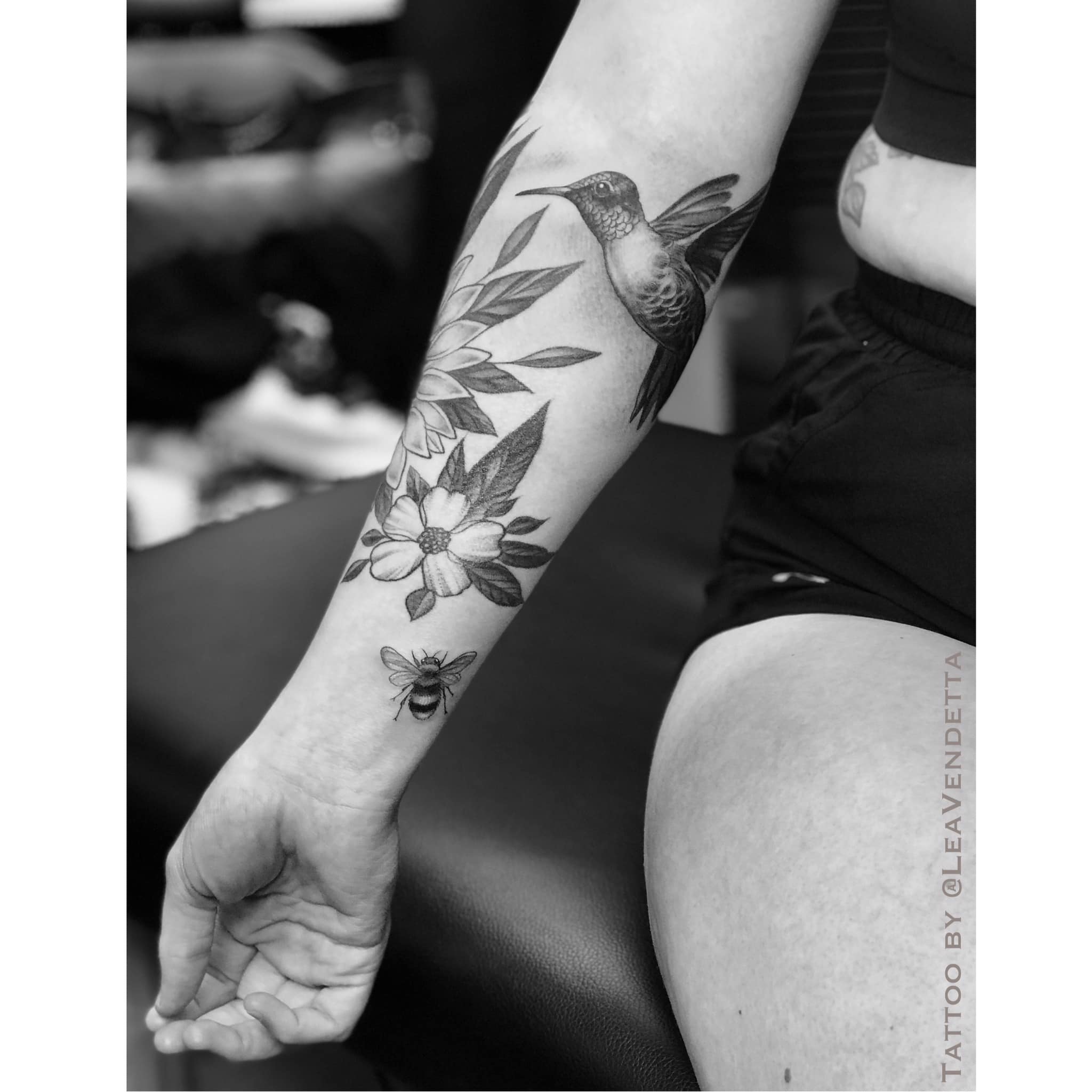 Flowers, birds, butterflies, bees tattoo on sleeve by Lea Vendetta