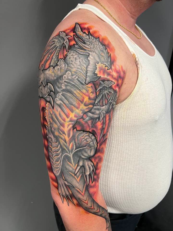 Full arm coverup tattoo by Zak Schulte