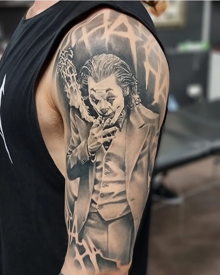 Joker tattoo on half sleeve by Levi Athan